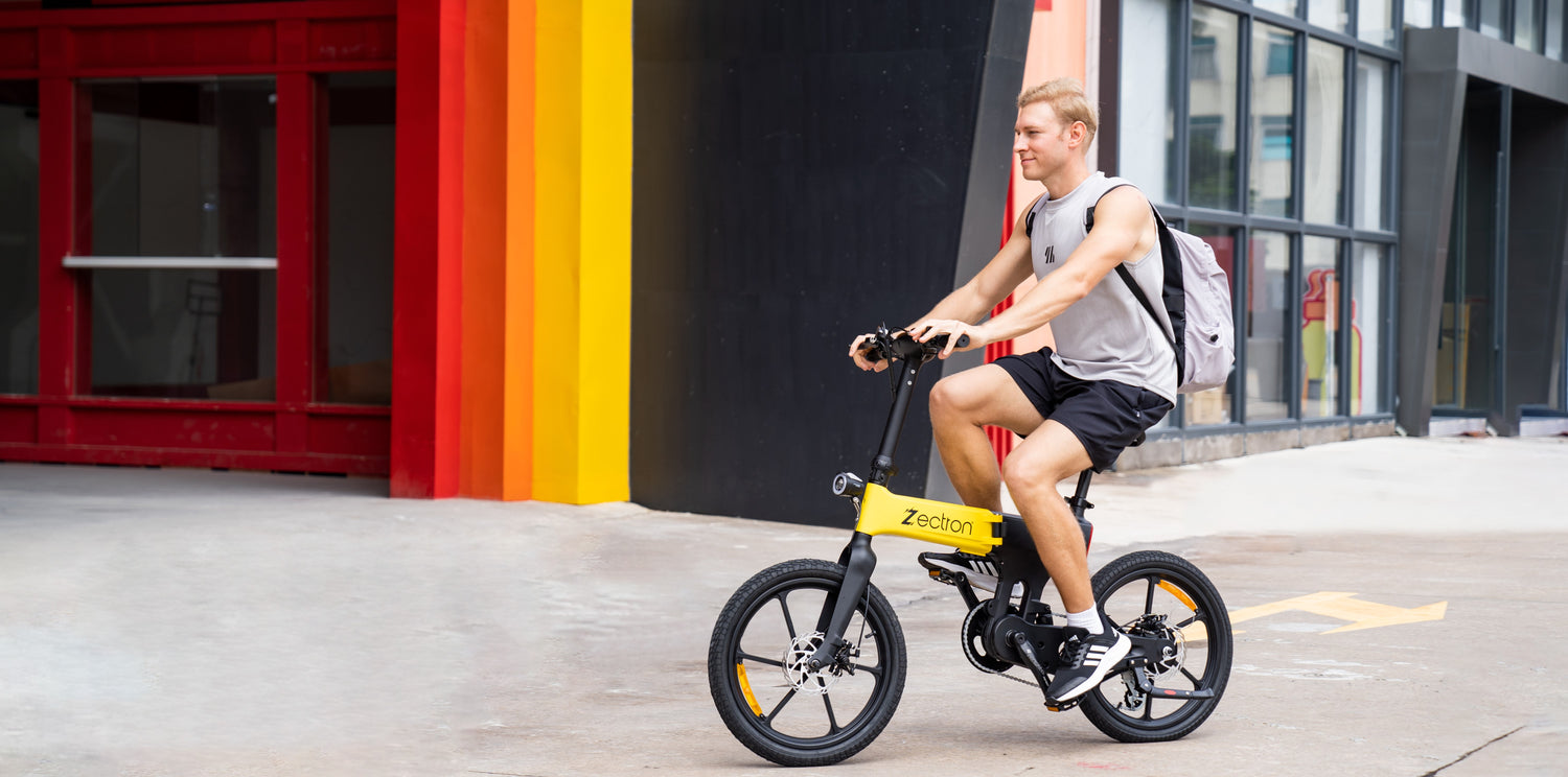 Student riding to class on an electric Zectron Z1 e-bike